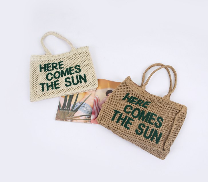 The Sun lettering branch bag