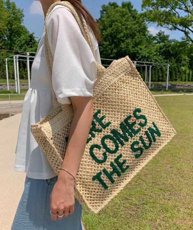 The Sun lettering branch bag