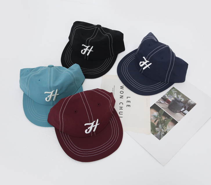 H embroidery nylon stitch ball cap