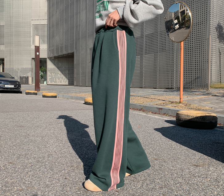 Woody Russell napping wide training pants